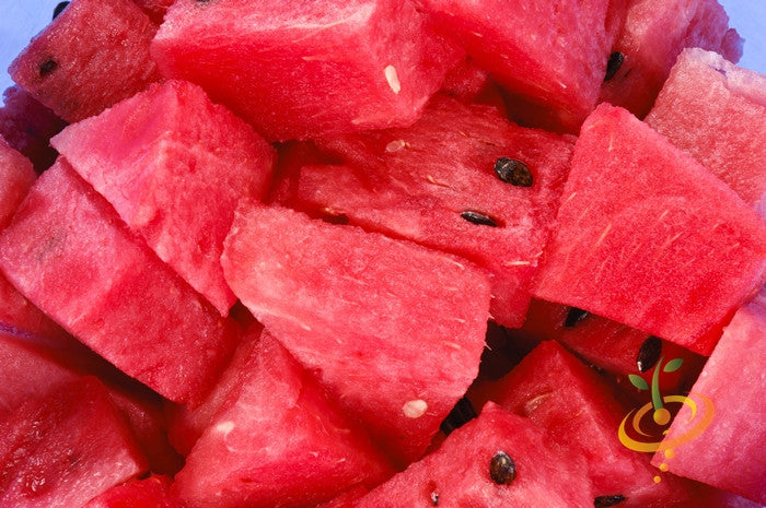 Close-up of bright red, juicy Watermelon Black Diamond cubes with seeds